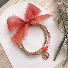 Add some sparkle to your Christmas this year! Limited availability! Listing comes as a stack of two bracelets. Bracelets are made with durable, stretchy cord and glued knot. Made with 4mm gold filled beads. Please send me a message with any questions or if needing another size not listed. *Please note: -To avoid over stretching, roll bracelet off wrist. Keep out of direct sunlight and avoid water or harsh chemicals. Do not shower/ swim with bracelets. -All bracelets are final sale, but please fe Christmas Beaded Bracelets, Beaded Bracelets Gold, Bracelet Christmas, Bracelets Gold, Christmas Bead, Christmas Bracelet, Bracelet Stack, Stocking Stuffers, Final Sale