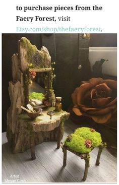 two small stools made out of wood with moss growing on them and a rose in the background