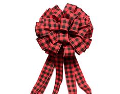 a red and black plaid bow on a white background