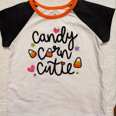 Toddler Girl Halloween Shirt Size 2t Nwot Says Candy Corn Cutie On The Front. Short Sleeve Black White And Orange. Comes From A Smoke Free Home. Candy Corn Shirt, Playful Short Sleeve T-shirt For Halloween, Kawaii Short Sleeve Halloween T-shirt, Toddler Girl Halloween, Pink Halloween T-shirt With Character Print, Short Sleeve T-shirt With Cat Print For Halloween, Halloween Girl, Candy Corn, Halloween Shirt