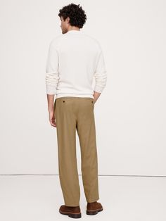 Look closely: these tailored cargo pants are cut in a Italian fabric we love for its use of warm wool.  Here, we put it to use in a silhouette that balances expert tailoring and comfort, thanks to hidden elastic at the waistband.  Mid-rise.  Tapered fit.  Cropped length.  Fabric from Italy's Alfa Fi mill.  Elastic waistband.  Zip fly with button closure.  Belt loops.  Front and back pockets.  Unlined.  Mid-rise.  Tapered fit.  Cropped length.  Inseam: Regular 28. 5" Model: Size 32, 6'2" (188cm). Italian Fabric, Pull On Pants, New Woman, Cargo Pants, Banana Republic, Style Inspiration, Pants