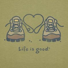 a pair of shoes with the words life is good written on them and a heart