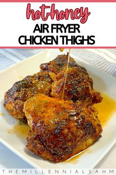 honey air fryer chicken thighs on a white plate with text overlay that reads honey air fryer chicken thighs