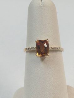 Solid 14kt Yellow Gold Ring Natural Citrine is 7x5 mm Emerald Cut Natural Diamond is 0.05 Tcw Ring Size is 7 WITH GIFT BOX Stackable Gemstone Rings, Baby Gold Rings, Yellow Citrine Ring, November Birthstone Jewelry, November Birthstone Ring, Peridot Pendant, Natural Diamond Ring, Yellow Citrine, Ruby Earrings