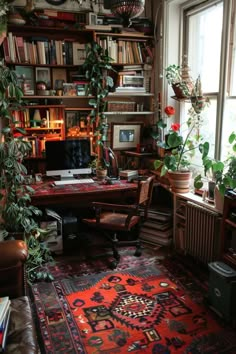 a living room filled with furniture and lots of plants