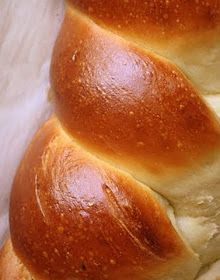 three loaves of bread sitting on top of each other