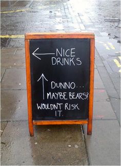 a chalkboard sign with writing on it that says nice drinks and bunno maybe bears wouldn't ask if it