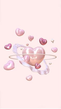 a pink heart surrounded by hearts floating in the air