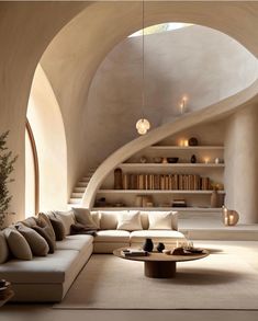 a living room filled with lots of furniture next to a spiral shaped wall mounted book shelf