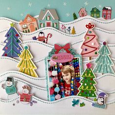 a christmas card with an image of a child's face surrounded by holiday decorations