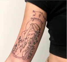 a woman with a tattoo on her arm