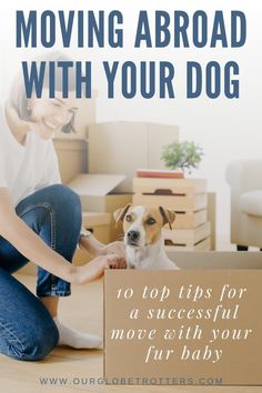 a woman sitting on the floor petting a dog in a moving box with text overlay