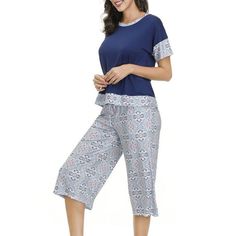 Ink+Ivy Capri And Tee Pajama Set For Women. 95 Percent Polyester 5 Percent Spandex Blue Stretch Top For Sleep, Purple Casual Sleepwear For Loungewear, Casual Purple Sleepwear For Loungewear, Casual Purple Sleepwear, Purple Cotton Bedtime Top, Comfortable Blue Tops For Relaxation, Blue Stretch Sleepwear, Purple Cotton Sleepwear For Relaxation, Blue Stretch Sleepwear Sets