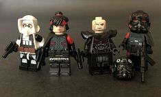 three lego star wars characters standing next to each other