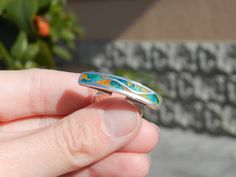 The advantages of the cloisonne enamel ring: 🔷 it is lightweight 🔷 100 % handmade 🔷 is unique, one of a kind 🔷 reasonable size and weight allows to wear every day 🔷 matches with different types of outfits - dresses and pants as well 🔷 May be a perfect gift for people who lover handmade gifts ... This artwork ring is 100 % handmade by me in my studio. The technique is called Cloisonne enamel which is well known in Georgia. Cloissone is using tiny metal strips to make a pattern then putting powder enamel into the spaces to make a design. Then it is heated in a kiln until the powder becomes glass. Cloisonne enamel is such a delicate art form... Many people in my country love buying handmade cloisonne enamel jewelry because they are unique and special!  USED MATERIALS: Fine silver, sterl Cloisonne Enamel Jewelry, Georgian Jewelry, Outfits Dresses, Artisan Rings, Cloisonne Enamel, Enamel Ring, Large Ring, Enamel Jewelry, Buy Handmade