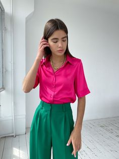 Satin shirt women Silk Shirt Satin Shirt 100% Silk Blouse Silk Shirts Silk Blouses Satin Silk Fuchsia Silk Blouse Pink satin shirt⭐Our fabric:We have used a premium quality satin and 100% silk: it's light and soft, pleasant to wear and easy to wash. ⭐Please, note:• Colors may slightly differ from images due to monitor used;• You may be a subject to additional taxes from the country you will order delivery to.⭐Refund/ Returns / Exchanges for pants are not accepted due to the items being custom ma Short Sleeve Silk Shirt Outfit, Green Pants Pink Shirt Outfit, Pink Short Sleeve Shirt Outfit, Pink Summer Workwear Shirt, Pink Shirt For Workwear In Summer, Pink Short Sleeve Blouse For Formal Occasions, Summer Formal Blouse With Spread Collar, Chic Pink Blouse With Spread Collar, Formal Summer Blouse With Spread Collar