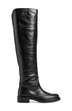 A classic riding boot takes a dramatic turn with smooth leather composition and an over-the-knee silhouette. 1 3/4" heel 20 1/2" shaft; 14" calf circumference Pull-on style Leather upper/synthetic lining and sole Made in Spain Classic Wide Calf Knee-high Boots For Riding, Classic Knee-high Boots With Leather Sole For Riding, Elegant Wide Calf Knee-high Riding Boots, Elegant Wide Calf Knee-high Boots For Riding, Classic Knee-high Boots In Calf Leather, Classic Wide Calf Knee-high Boots In Calf Leather, Classic Calf Leather Wide Calf Knee-high Boots, Elegant Wide Calf Riding Boots, Classic Riding Knee-high Boots Medium Width