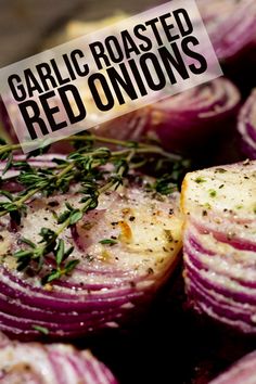 garlic roasted red onions with herbs on top