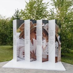 an outdoor display with three different pictures on it