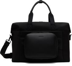 Water- and scratch-resistant nylon twill duffle bag in black. · QuickSnap™ Modular Kit System · Buffed faux-leather trim throughout · Press-stud tab at rolled carry handles · Adjustable and detachable webbing shoulder strap · Patch pocket and luggage strap at face · Logo patch at back face · Zip pocket at back face · Bumper pads at base · Two-way zip closure · Zip pocket and patch pockets at interior · Laptop compartment · Twill lining · H11 x W16.5 x D7.5 Detachable water- and scratch-resistant Black Coated Canvas Bag For Business Trips, Black Coated Canvas Bags For Business Trips, Black Rectangular Duffle Bag In Coated Canvas, Functional Black Coated Canvas Shoulder Bag, Black Coated Canvas Satchel For Travel, Black Travel Bag With Luggage Sleeve In Coated Canvas, Black Coated Canvas Travel Bag With Luggage Sleeve, Black Coated Canvas Bag With Luggage Sleeve, Modern Black Coated Canvas Travel Bag