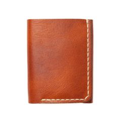 A leather Trifold wallet that carries everything you could possibly need.On the go, this wallet is the perfect accessory. You'll soon find that this wallet can take everything you throw at it and store it neatly folded away. Flip out your ID whenever it's needed, and fill the billfold with any size currency, notes, or even receipts.This full-grain leather wallet is designed to hold a lot of cards and a lot of cash. Easily flip out your ID when it's needed and the wallet will naturally fold back Classic Handmade Leather Trifold Wallet, Versatile Trifold Leather Wallet, Classic Leather Trifold Wallet, Luxury Textured Leather Trifold Wallet, Full Grain Leather Wallet, Brown Leather-lined Trifold Wallet, Leather Trifold Wallet, Flip Out, Horween Leather