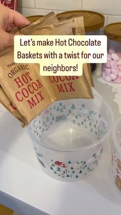 two bags of hot chocolate sitting on top of a counter