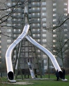 a large metal structure in the middle of a park