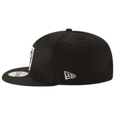 the new era fitted hat in black and white