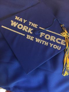 a graduation cap that says may the work force be with you