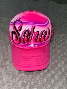 Custom airbrushed hat. Your choice of name, colors, and color of hat. We carry White, black, neon pink, neon green, & royal blue, .Be sure to leave your specifics for your order. All hats are made on foam/mesh trucker hats, hat color your receive will depend on the color you order. Hats are adjustable back, and can be made to fit children and adults. Sweet 16 Shirts, Softball Helmet, Custom Airbrushing, Perfect Birthday Party, Calligraphy Styles, Airbrush Art, Graffiti Styles, Christmas Morning, Neon Green