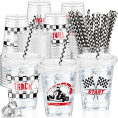 plastic cups and straws with racing flags on them