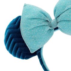 Like Minnie Mouse, you'll be a sparkling, timeless classic in this azul ears headband with signature glittery bow! * Soft foam mouse ears * Soft-feel finish and embroidered zig-zag on ears and headband * Contrasting oversize bow with glitter finish * One size * Created for Disney Parks * Made from polyester, excluding trims * Wipe clean ** Authentic Disney Parks merchandise. ** Magic Bands, Ears Headband, Disney Home, Disney Merchandise, Disney Star Wars, Ear Headbands, Mouse Ears, Shop Mens Clothing, Baby Disney