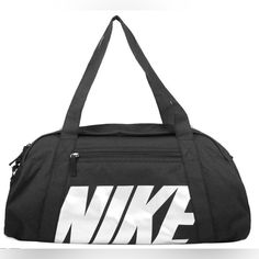 Nike Gym Club Sports Bag (24 Litres). No Matter What Your Fitness Goal, This Sports Bag Is Your Companion. The Simple, Elegant Nike Gym Club Women's Sports Bag Offers Space For All Your Essentials Without Unnecessarily Weighing It Down. The Main Compartment With Double Zipper Can Hold Shoes, Clothes And Other Items. The Zip Pocket On The Front Is Suitable For Organising Small Items. Whether With The Detachable And Adjustable Shoulder Strap Or Handles, This Bag Is A No-Fuss Essential. More Detail Casual Sports Bags With Logo, Sporty Bags With Logo For Daily Use, Practical Nike School Bags, Sporty Logo Bags For Daily Use, Rectangular Black Bag For Sports Events, Sporty Daily Use Bag With Logo, Sporty Bags With Logo, Sporty School Bags With Logo, Practical Black Bag For Sports Events