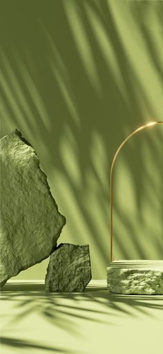 a green background with rocks and a lamp