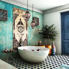 a bath room with a large tub and a potted plant