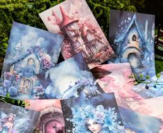 there are many cards with pictures on them in the shape of houses and fairy houses