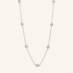 This 3.5mm bezel-set cubic zirconia station necklace is set in sterling silver. The cable chain measures 18 inches in length and secures with a spring-ring clasp. Classic Silver Station Necklace With Delicate Chain, Silver Round Station Necklace For Anniversary, Alternative Metal, Necklace Clasps, Silver Prices, Station Necklace, Chain Ring, Stone Settings, Necklace Designs