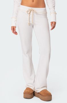 Throw it back to Y2K style with these low-rise sweatpants crafted from an ultracomfy cotton blend and styled with minimal seam detailing. Drawstring waist 50% cotton, 50% polyester Machine wash, dry flat Imported Low Rise Sweatpants, Trendy Outfit Inspo, Chic Romper, Stylish Summer Outfits, Cute Pants, Cute Everyday Outfits, Womens Loungewear, Dream Clothes, Everyday Outfits