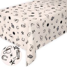 a table cloth with black and white designs on it