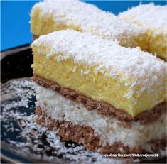 two pieces of cake sitting on top of a plate