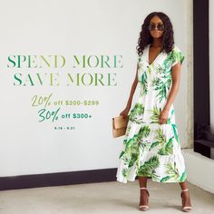 a woman standing in front of a wall with the words spend more save more