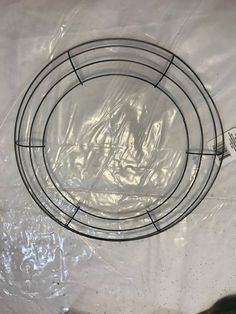 a glass plate sitting on top of a plastic bag