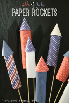 fourth of july paper rockets made with crepe paper and american flags on sticks