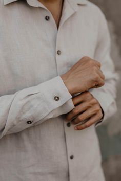 A beautiful classic linen shirt with seashell buttons. A great choice for any occasion- wear it to work, a date or even a wedding! Choose from 13 colors and 5 sizes.  ABOUT Hector classic linen shirt Model Motiejus is 183cm/6' and wearing cream HECTOR shirt in size M Available in S, M, L, XL, XXL  Made from 100% certified European linen Stone washed for maximum softness Available in 13 colors  Size Chart: S: US 34/ UK 34/ EU 44  M: US 36-38/ UK 36-38/ EU 46-48 L: US 40-42/ UK 40-42/ EU 50-52 XL: US 44/ UK 44/ EU 54 XXL: US 46/ UK 46/ EU 56 Please note that colors may vary due to different monitors and browsers. To ensure that you get the exact color you desire, we recommend ordering linen swatches: https://www.etsy.com/listing/922916804/linen-fabric-color-swatches-amourlinen CARE * Wash yo Rosy Brown, Linen Summer, Mens Linen, Shirt Model, Men's Button Down Shirt, European Linens, Linen Pillow Cases, Linen Shorts, Linen Clothes