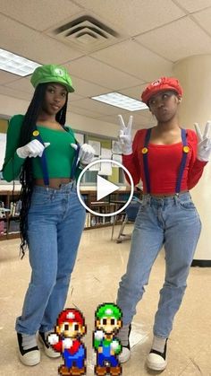 two people dressed up as mario and luigi in the middle of a video game room