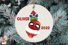 a christmas ornament hanging from a tree