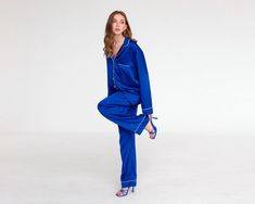 Blue Satin Pajamas, Pajamas For Women, Bridesmaid Pajamas, Birthday Pajamas, Gift For Her, Satin Pajamas Set, Sleepover, Bachelorette Party Your dreams will be like never before! These luxurious pajamas made of premium satin not only look beautiful, they have the incredible ability to give the most comfortable sleep to their owners. * Loose fit * Long sleeved shirt with buttons at the front slips below the hips  * Shirt with buttons and chest pocket * Pants with elastic waistband Available colors: * Milk * Burgundy * Hot pink * Black * Royal blue Shipping: * Free shipping takes about two weeks. * Express shipping takes only 6-8 working days. An extra fee of $35 should be paid for this option. Please, note: * Colors may slightly differ from images due to monitor used; * You may be a subject Blue Sleepwear Sets With Long Pants, Blue Long Pants Sleepover Sets, Blue Sleepover Sets With Long Pants, Blue Long Sleeve Pant Set For Loungewear, Blue Long Sleeve Loungewear Pant Set, Blue Satin Pajamas, Sleepover Bachelorette Party, Sleepover Bachelorette, Luxurious Pajamas