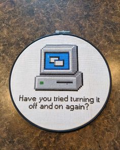 a cross stitch pattern with the words have you tried turning it off and on again?