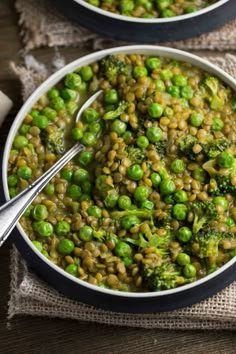 two bowls filled with peas and broccoli on top of a table