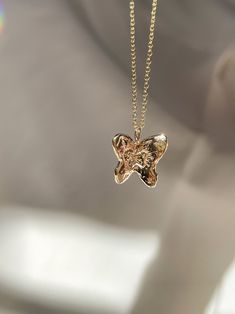 The Papillon is a messenger of angels, a spirit guide leading and guarding you along the way, illuminating your path. The butterfly for me has become a talisman symbolizing hope, renewal, transformation, and new beginnings. Solid 14k yellow gold on 16.5" or 18.5" chain. 🦋 I wanted to carve an illuminated butterfly within the center of the papillon, as a symbol of our own expansion and growth, as a chrysalis who starts the transformation process over and over again, constantly evolving, growing, 14k Yellow Gold Butterfly Pendant Necklace, Luxury Yellow Gold Butterfly Pendant Necklace, Gold Spiritual Necklace With Butterfly Charm, Spiritual Gold Necklace With Butterfly Charm, Luxury Gold Butterfly Pendant Necklace, Luxury Gold Butterfly Charm Necklace, Papillon Butterfly, Constantly Evolving, Spirit Guide